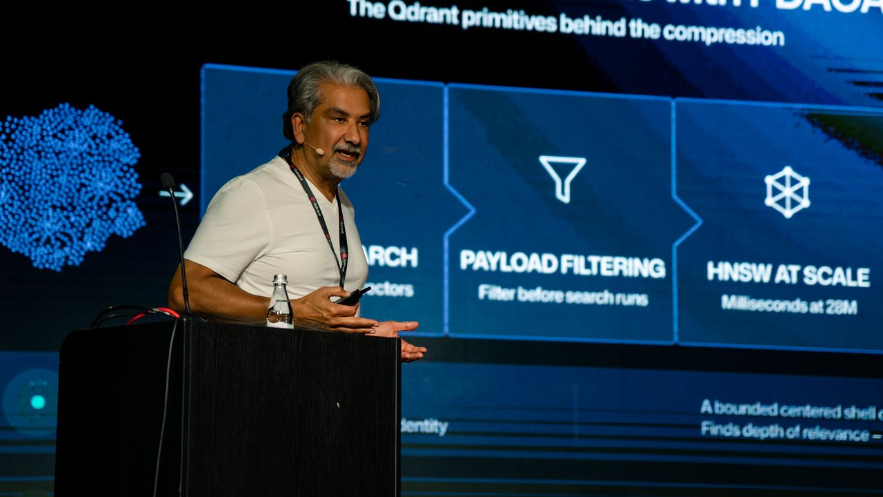 Saran Saund presenting PDAOAI on stage at Qdrant Vector Space Day 2026